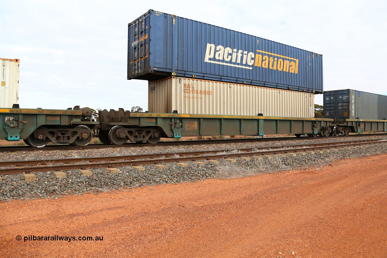160529 8833
Parkeston, 6MP4 intermodal train, RRXY 3 platform 2 of 5-pack well waggon set, one of eleven built by Bradken Qld in 2002 for Toll from a Worley-Williams design with a 40' Rail Containers box SCFU 410204 in the well and 48' Pacific National box PNXL 4301 on top.
Keywords: RRXY-type;RRXY3;Worley-Williams;Bradken-Rail-Qld;