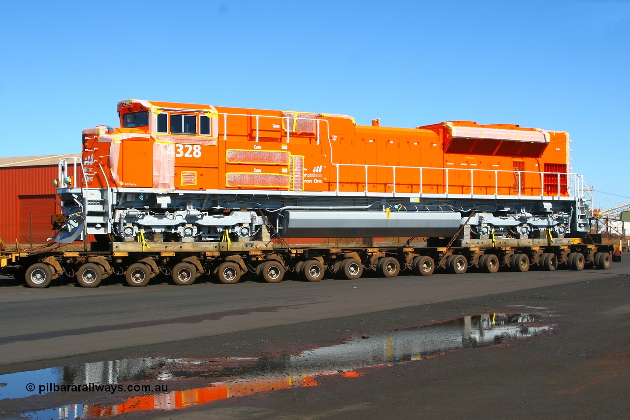 080614 2629
Port Hedland, Gilbert Street, the last BHP Billiton Electro-Motive built SD70ACe 'Pumpkin' 4328 serial 20066862-057 and originally destined to be BNSF 9186 is turning into Gate 9 after being unloaded off the heavy lift ship DA QIANG Saturday 14th June 2008.
Keywords: 4328;Electro-Motive;EMD;SD70ACe;20066862-057;BNSF-9186;