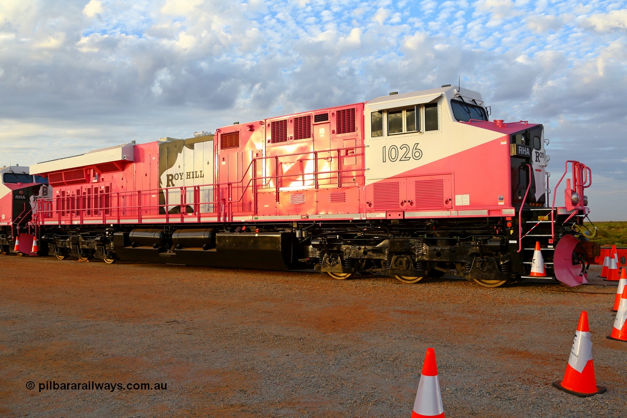 180918 0227r
Boodarie, about the 23 km at Roy Hill Rail Construction Yard, brand new Roy Hill RHA class loco RHA 1026 with serial 64743 a GE Fort Worth built GE model ES44ACi in the special Breast Cancer Awareness livery undergoes commissioning prior to official handover. All five were built at General Electric's Fort Worth Texas plant. 18th September 2018. 
[url=https://goo.gl/maps/57fPumfasGv]GeoData[/url].
Keywords: RHA-class;RHA1026;GE-Fort-Worth;GE;ES44ACi;64743;