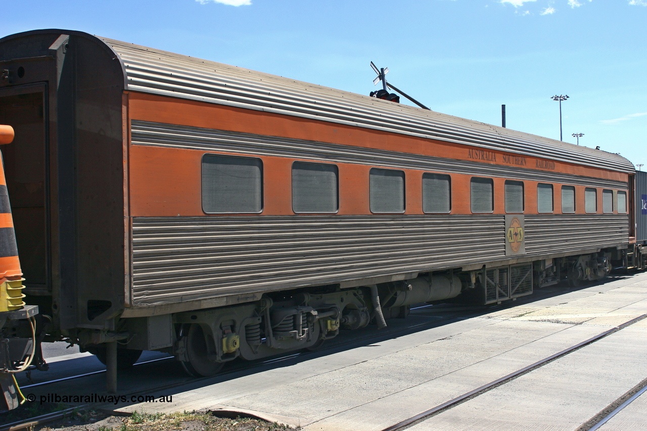 051230 1049
Melbourne, Australian Southern Railroad JTA type crew accommodation coach JTA 2, originally built in 1951 by SAR Islington Workshops as corten steel V&SAR Joint Stock twinette sleeping car Mokai for The Overland. Recoded to JTA 2 in 1987. Written off and sold in 1995. Converted to ASR crew car 1999? Converted to GWA liveried ADFY 7 in 2014.
Keywords: JTA-type;JTA2;SAR-Islington-WS;Mokai;