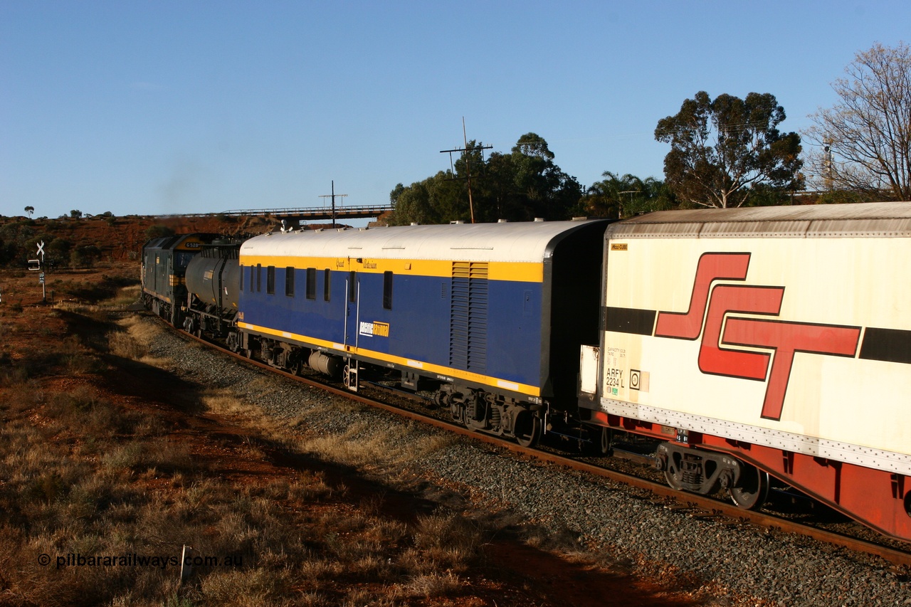 070529 9472
Kalgoorlie, SCT VPAY type crew accommodation car VPAY 2 'Great Artesian' on train 2PM9, built by Tulloch Ltd NSW in 1968 as a narrow gauge brake van with sleeping accommodation as NHRD type NHRD 79, converted to standard gauge in 1981 and coded HRD type HRD 361. Recoded to AVDY in October 1982, then to AVDP. Sold to WCR, then in October 2000 overhauled for crew car use and coded VPAY 1 on SCT services and owned by Freight Australia. Was later sold to Pacific National and subsequently scrapped 2016.
Keywords: VPAY-type;VPAY2;Tulloch-Ltd-NSW;NHRD-type;NHRD79;HRD-type;HRD361;AVDY-type;AVDP-type;