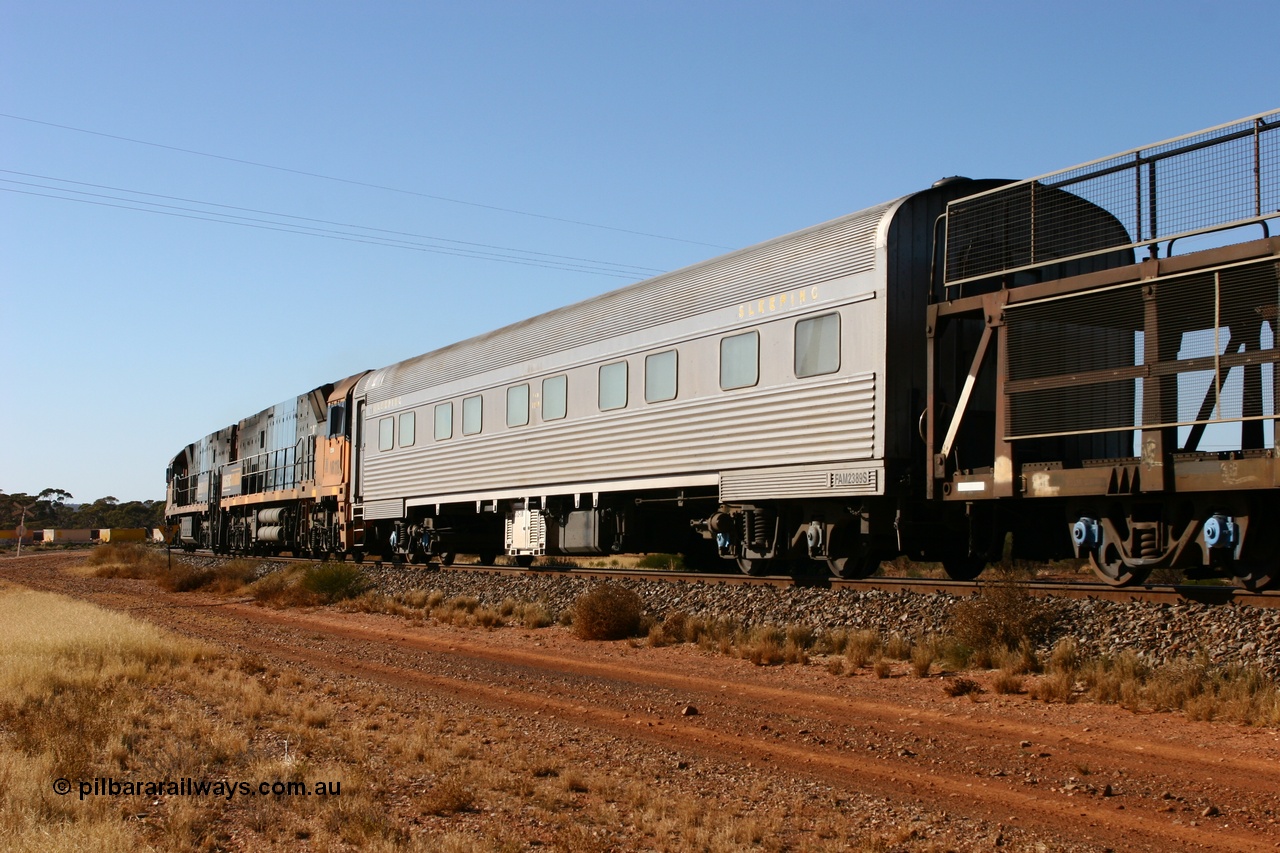 070530 9521
Parkeston, Pacific National FAM type crew accommodation coach FAM 2389 on train 3PM6, built for the NSWGR by Comeng NSW in 1976 as part of a batch of ten FAM type twinette sleeper cars, FAM 2389 was also the Lithgow breakdown train accommodation car for a time, converted to a crew car by Bluebird Rail at Islington in September 2005.
Keywords: FAM-type;FAM2389;Comeng-NSW;