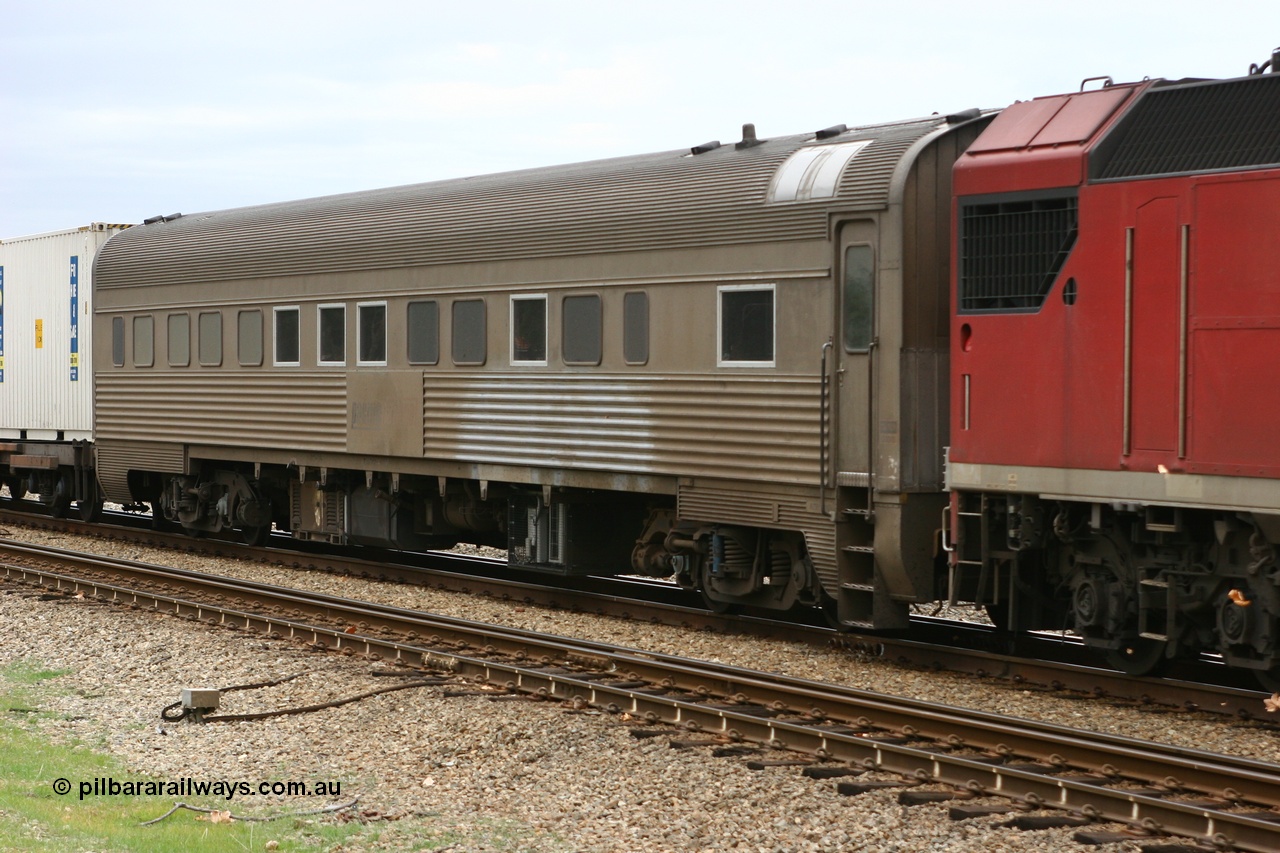 070607 10040
Midland, Pacific National RZBY type crew accommodation car RZBY 911 on train 2SP5, built by Comeng NSW as ER type stainless steel air conditioned crew dormitory car ER 211 in 1969, renumbered to ER 911 in 1974, sold to National Rail and converted to crew car in 1997.
Keywords: RZBY-type;RZBY911;Comeng-NSW;ER-type;ER211;ER911;