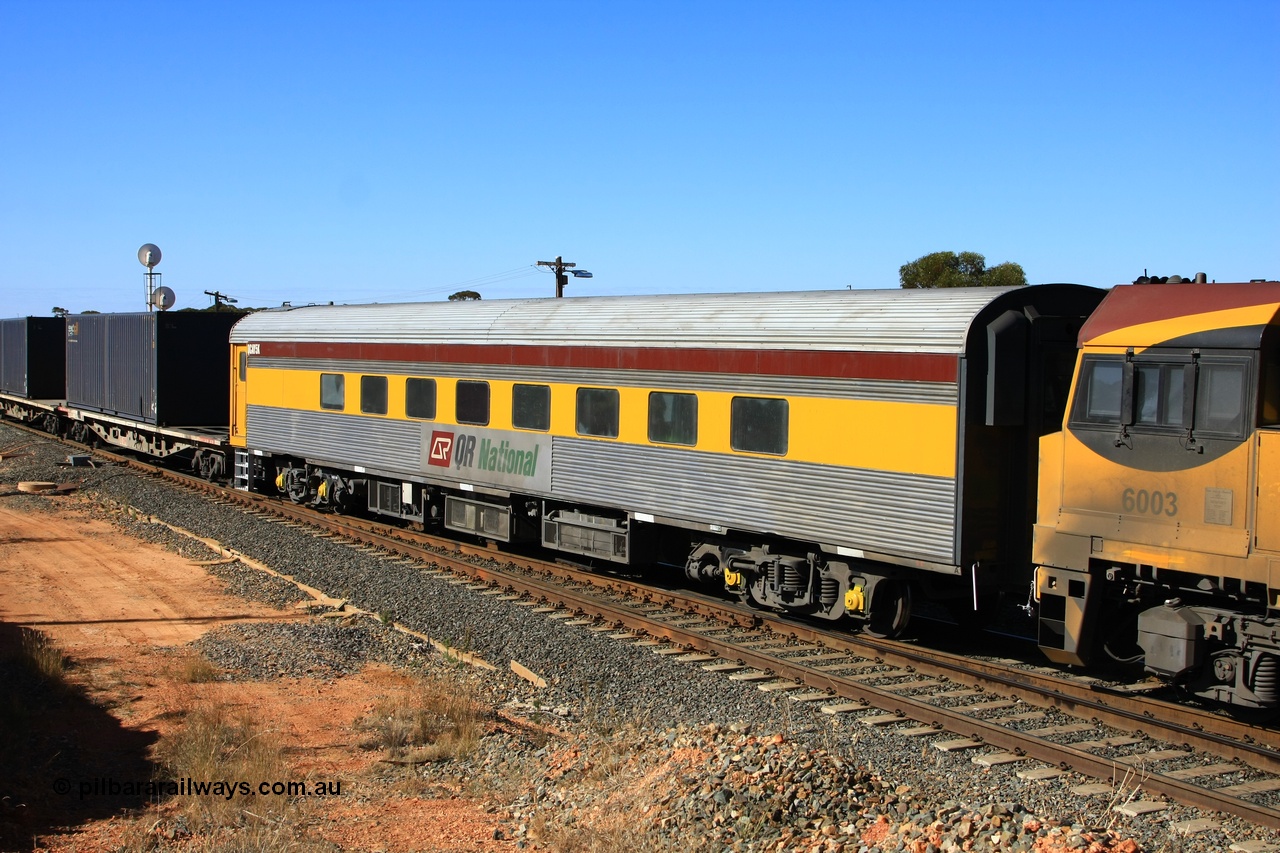 100602 8609
West Kalgoorlie, crew accommodation coach QCAY 5 was built by the South Australian Railways Islington Workshops in 1958 as Juki for The Overland as a corten steel roomette sleeping car. Sold to Blue Bird Rail in 1997, then to Grand Corporate Rail, renamed BMC 2, in 2003 sold to Great Southern Railway and renamed Sir John Forrest. Purchased by Bluebird Rail and converted to crew car and then sold to Queensland Rail.
Keywords: QCAY-type;QCAY5;SAR-Islington-WS;Juki;JRA-type;JRA5;