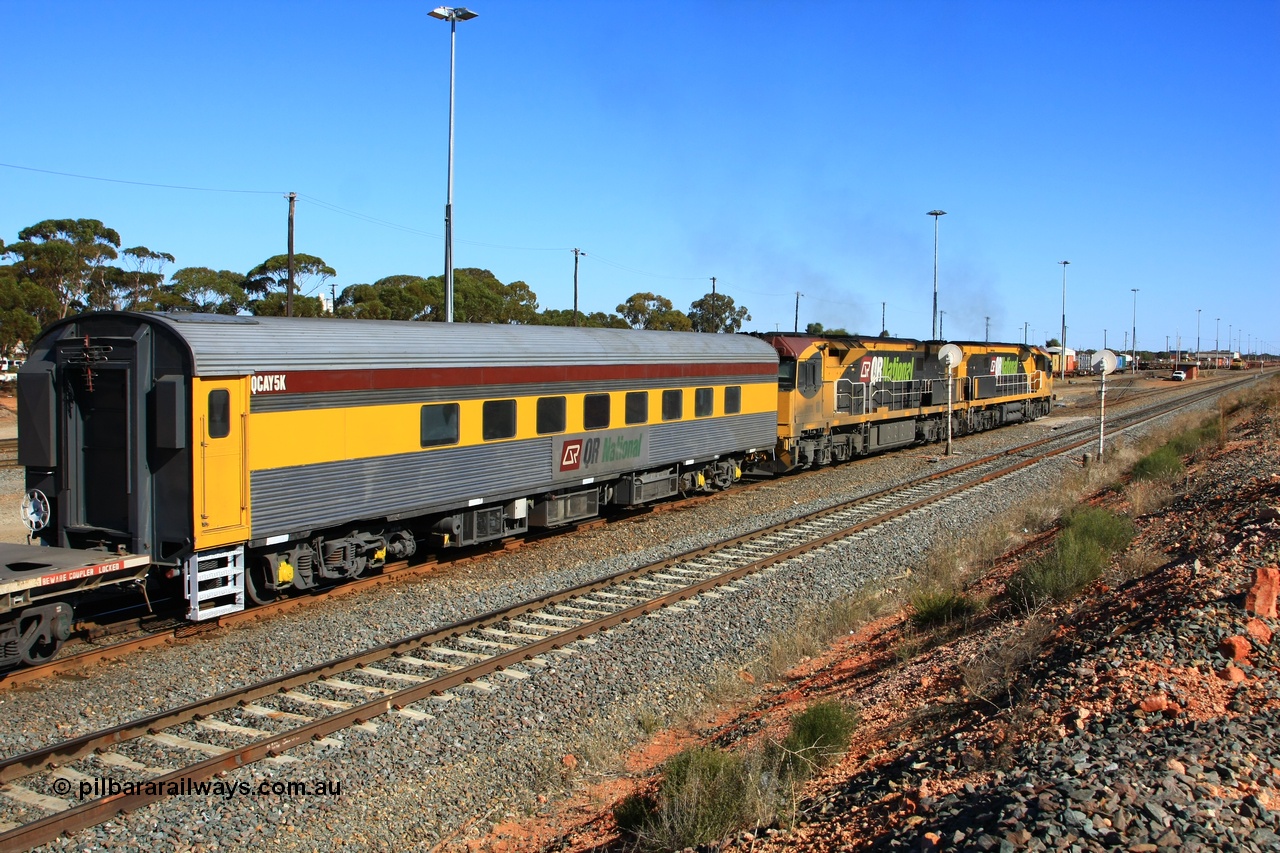 100602 8611
West Kalgoorlie, crew accommodation coach QCAY 5 was built by the South Australian Railways Islington Workshops in 1958 as Juki for The Overland as a corten steel roomette sleeping car. Sold to Blue Bird Rail in 1997, then to Grand Corporate Rail, renamed BMC 2, in 2003 sold to Great Southern Railway and renamed Sir John Forrest. Purchased by Bluebird Rail and converted to crew car and then sold to Queensland Rail.
Keywords: QCAY-type;QCAY5;SAR-Islington-WS;Juki;JRA-type;JRA5;