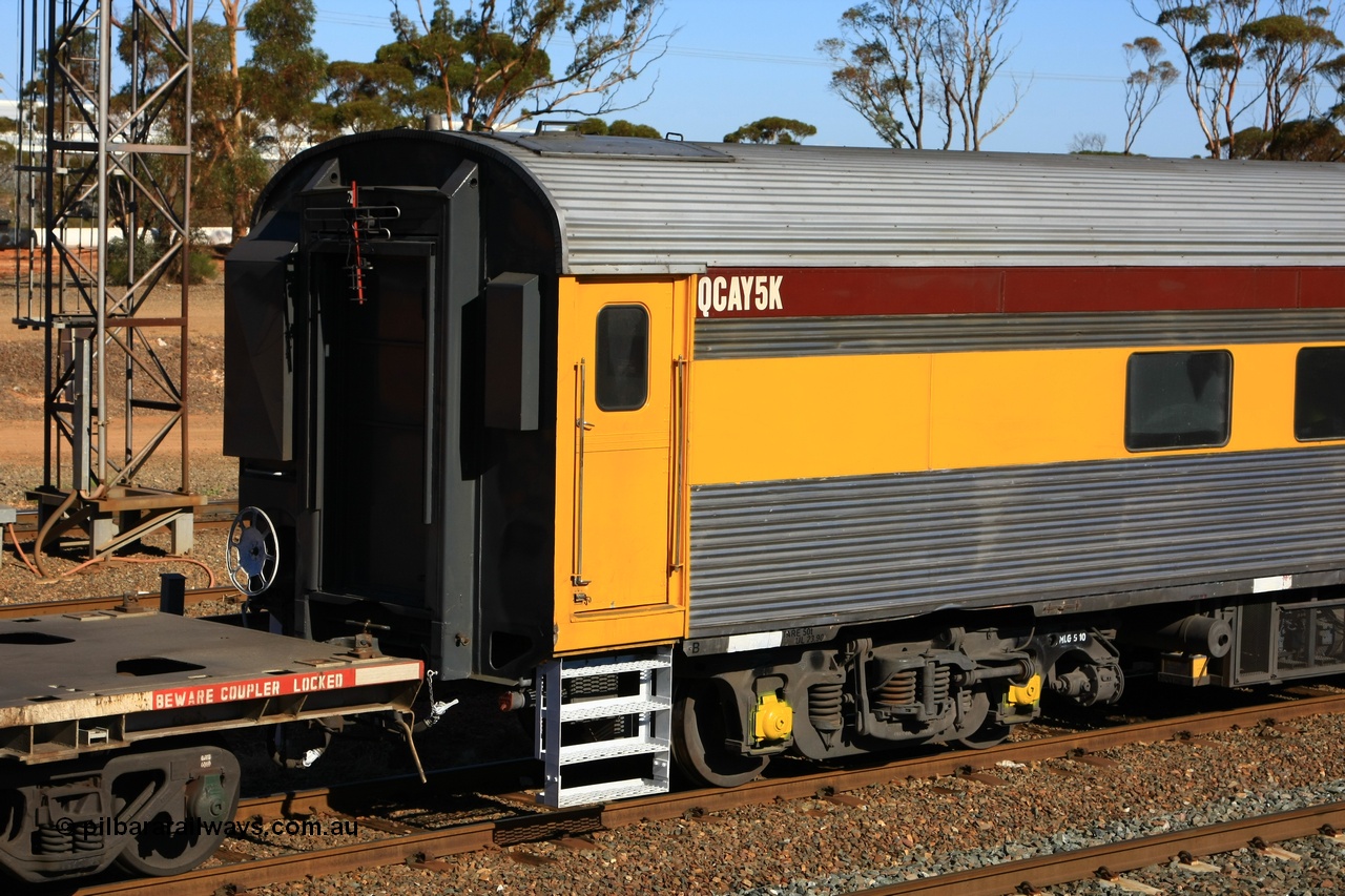 100602 8652
West Kalgoorlie, crew accommodation coach QCAY 5 was built by the South Australian Railways Islington Workshops in 1958 as Juki for The Overland as a corten steel roomette sleeping car. Sold to Blue Bird Rail in 1997, then to Grand Corporate Rail, renamed BMC 2, in 2003 sold to Great Southern Railway and renamed Sir John Forrest. Purchased by Bluebird Rail and converted to crew car and then sold to Queensland Rail.
Keywords: QCAY-type;QCAY5;SAR-Islington-WS;Juki;JRA-type;JRA5;
