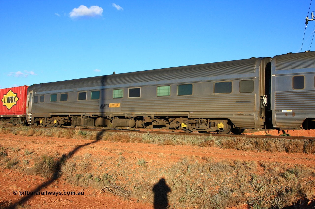 100602 8720
Parkeston, Pacific National RZAY type crew accommodation car RZAY 940 was built by Comeng NSW as an ARJ type stainless steel air conditioned first class roomette sleeping car ARJ 240 in 1968, allocated to the Indian Pacific Joint Stock in 1970, renumbered to ARJ 940 in 1974 and sold to National Rail and converted to crew car in 1997.
Keywords: RZAY-type;RZAY940;Comeng-NSW;ARJ-type;ARJ240;ARJ940;