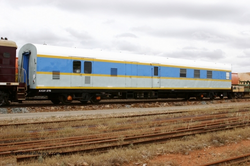 051101 6455
Parkeston, South Spur Rail AVDP type crew accommodation coach AVDP 277, built for the Commonwealth Railways by Comeng NSW as a brake van with sleeping accommodation as HRD type HRD 277 in 1971, modified for relay working in 1977, recoded to AVDY in 1983, then in 2002 leased for MurrayLander service before being sold to South Spur Rail and in this livery from mid 2005.
Keywords: AVDP-type;AVDP277;Comeng-NSW;HRD-type;HRD277;AVDY-type;