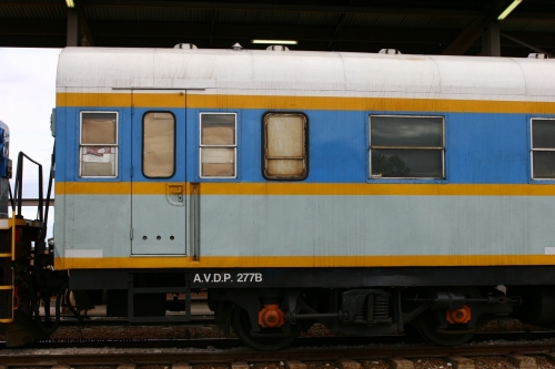 060529 4721
Parkeston, South Spur Rail AVDP type crew accommodation coach AVDP 277, built for the Commonwealth Railways by Comeng NSW as a brake van with sleeping accommodation as HRD type HRD 277 in 1971, modified for relay working in 1977, recoded to AVDY in 1983, then in 2002 leased for MurrayLander service before being sold to South Spur Rail and in this livery from mid 2005.
Keywords: AVDP-type;AVDP277;Comeng-NSW;HRD-type;HRD277;AVDY-type;