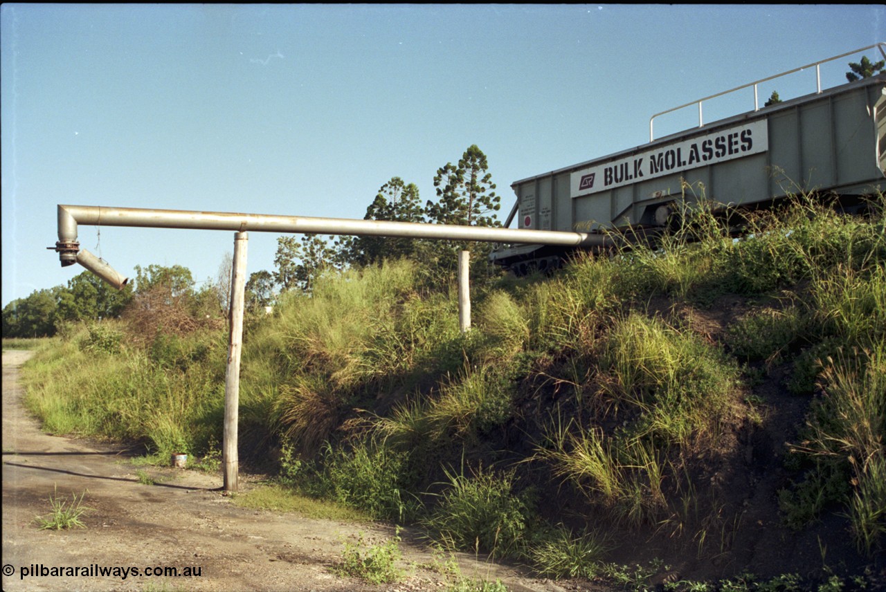 187-18
Monkland, Gympie Queensland. Molasses transfer station for unloading VMO type molasses waggons to road trucks. [url=https://goo.gl/maps/hagoEjM37G72]GeoData[/url].
