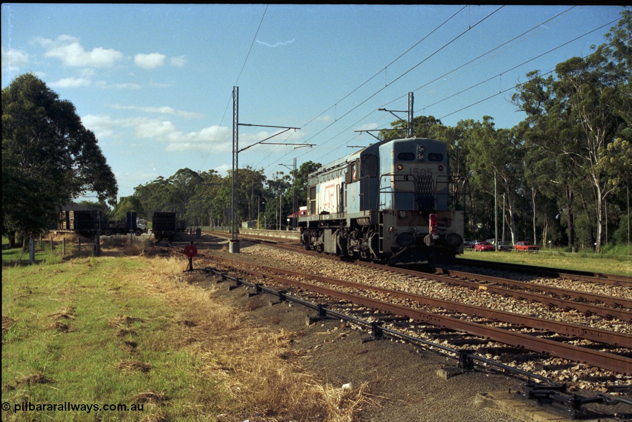 187-19
Beerwah, QR narrow gauge Comeng Qld built (under contract for Clyde Engineering) EMD model G22C unit 1505 serial 67-600 sits just north of Mawhinney St grade crossing. [url=https://goo.gl/maps/ug8czFZ4GjS2]GeoData[/url].
Keywords: 1502-class;1505;Comeng-Qld;EMD;GL22C;67-600;
