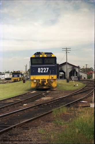 187-29
Yeerongpilly, Queensland, NSWSRA standard gauge loco depot, Clyde Engineering built EMD JT42C model 82 class unit 8227 serial 94-1334. [url=https://goo.gl/maps/MTvf4SEKLkJ2]GeoData[/url].
Keywords: 82-class;8227;Clyde-Engineering-Braemar-NSW;EMD;JT42C;94-1334;