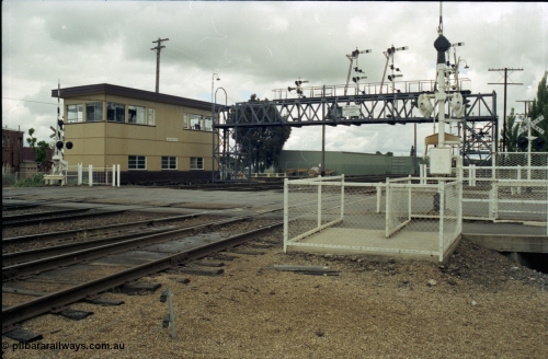 188-26
Junee, NSW Main South, looking north with Junee North Signal Box and the Olympic Hwy grade crossing.
