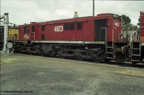 188-34
Junee, NSWSRA standard gauge locomotive depot, 48 class unit 4823 serial 83818 in the red terror livery. AE Goodwin built ALCo DL531 model. Unit scrapped in 1999.
Keywords: 48-class;4823;AE-Goodwin;ALCo;RSD-8;DL-531;83818;