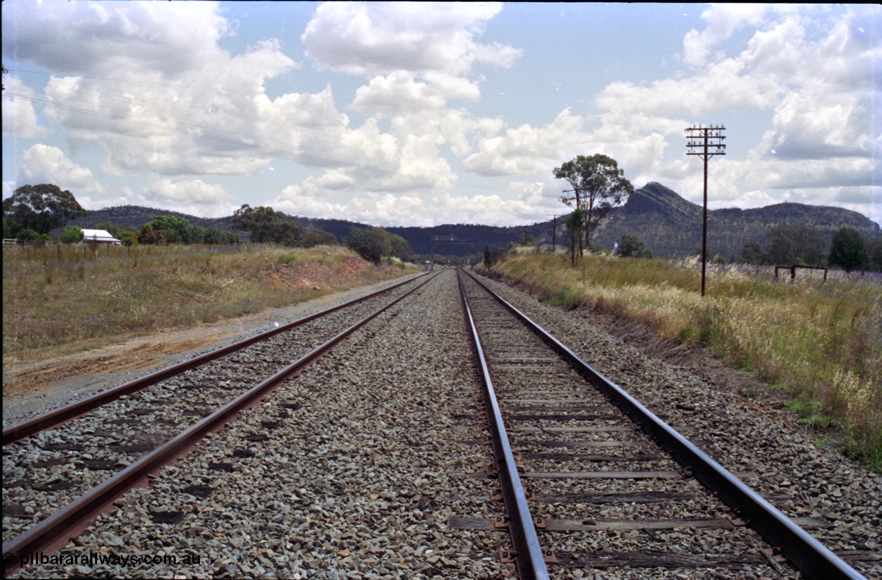 189-11
The Rock, located at the 550.29 km on NSW Main South line, view looking south along the Mainline with the Down Loop on the left.

