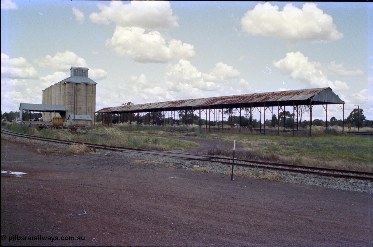 189-14
The Rock, located at the 550.29 km on NSW Main South line, view looking north with the Back Road with the silo complex and the 98 metre long bagged grain shed still standing.
