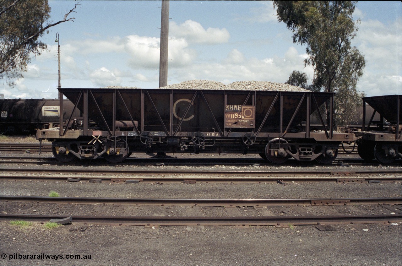 190-15
Cootamundra, NSW Main South, departmental waggon W 1195, a loaded NHWF type bogie ballast waggon NHWF 1195.
Keywords: NHWF-type;NHWF1195;W1195;