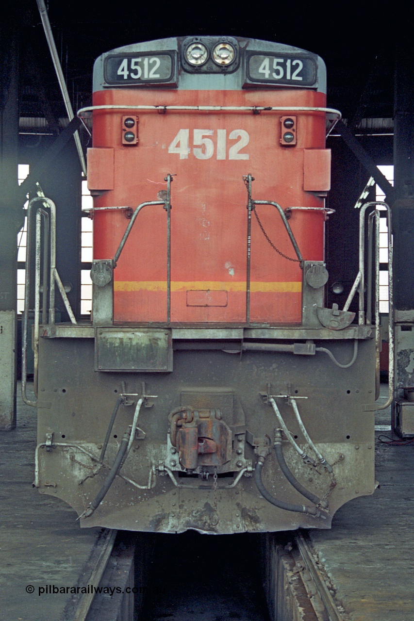 192-04
Junee, NSWSRA standard gauge locomotive depot, Junee Roundhouse, stored NSWGR 45 class unit 4512 an ALCo RSD-20 or DL-541 built by AE Goodwin in 1963 with serial 84154.
Keywords: 45-class;4512;AE-Goodwin;ALCo;RSD-20;DL-541;84154;