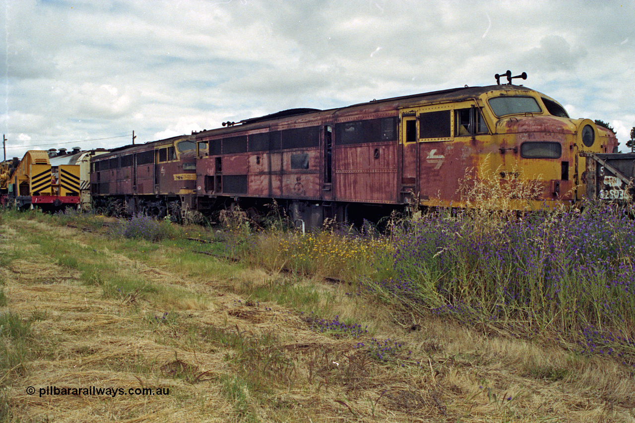 192-19
Junee, NSWSRA standard gauge locomotive depot, a pair of stored ALCo model DL-500B units in very poor condition.
Keywords: 44-class;AE-Goodwin;ALCo;DL-500B;