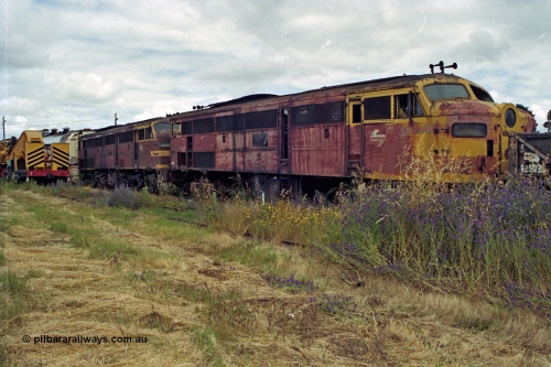 192-19
Junee, NSWSRA standard gauge locomotive depot, a pair of stored ALCo model DL-500B units in very poor condition.
Keywords: 44-class;AE-Goodwin;ALCo;DL500B;