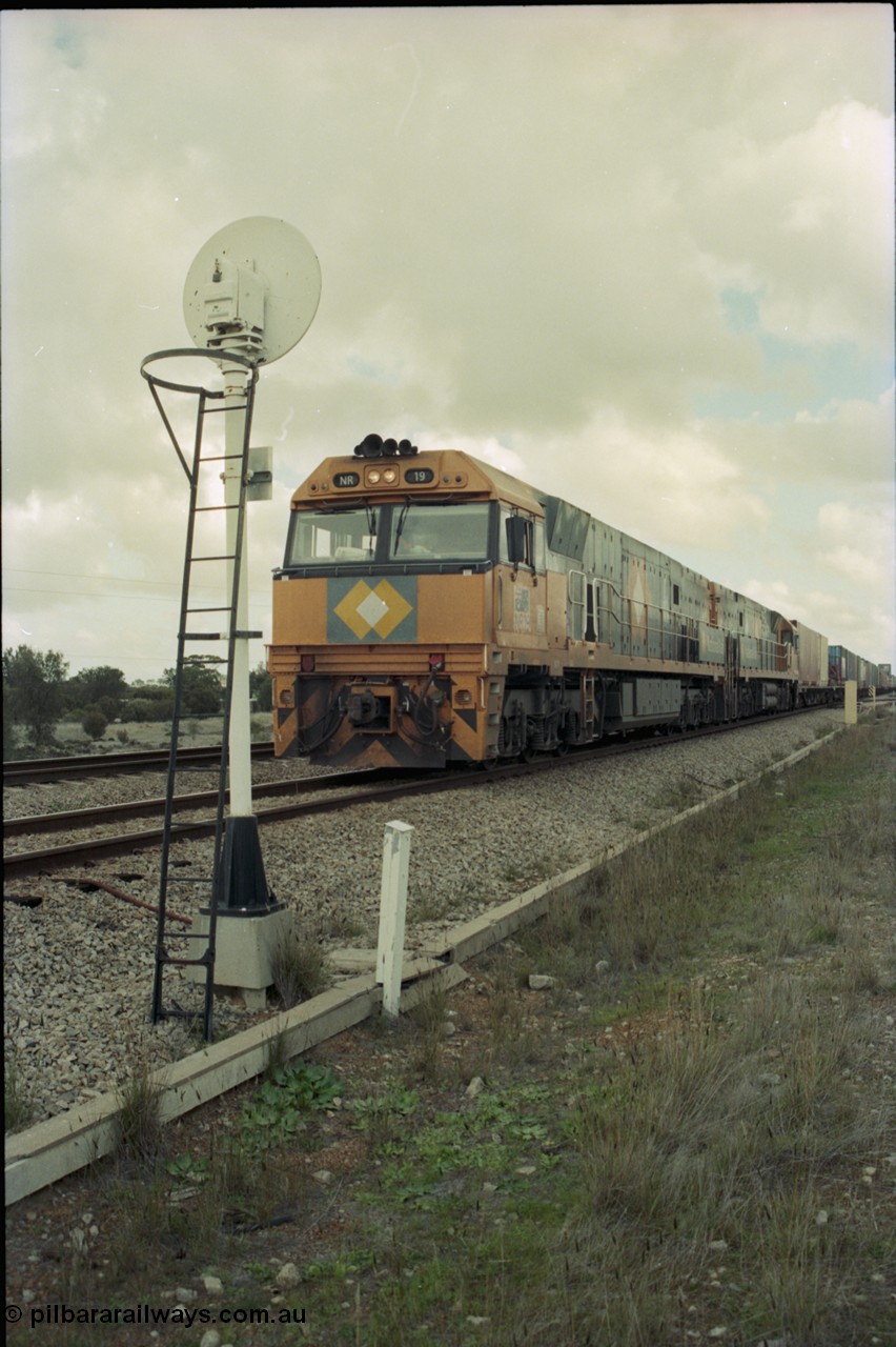 199-06
Meckering, National Rail NR class units NR 19 and NR 20 both being Goninan built GE Cv40-9i models head up train 7PM5 as they wait for a cross with the Prospector in the loop 1400 hrs 21st June 1997.
Keywords: NR-class;NR19;Goninan;GE;CV40-9i;7250-03/97-221;