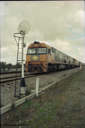 199-06
Meckering, National Rail NR class units NR 19 and NR 20 both being Goninan built GE Cv40-9i models head up train 7PM5 as they wait for a cross with the Prospector in the loop 1400 hrs June 21, 1997.
Keywords: NR-class;NR19;Goninan;GE;CV40-9i;7250-03/97-221;