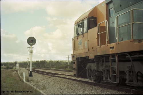 199-07
Meckering, National Rail NR class unit NR 19 Goninan built GE Cv40-9i model heads up train 7PM5 as it waits for a cross with the Prospector in the loop 1400 hrs June 21, 1997.
Keywords: NR-class;NR19;Goninan;GE;CV40-9i;7250-03/97-221;
