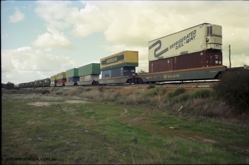 199-22
Meckering, train 7PM5 double stacked east bound with BOX CAR and Refrigerated Rail-Way containers and reefers, June 21, 1997.
