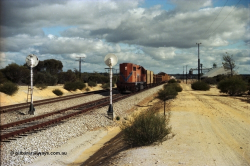 200-02
Moorine Rock, Westrail L class 271 Clyde Engineering EMD model GT26C serial 69-620 runs through the loop with the ballast cleaning train, known as the Circus Train while a Perth bound freighter sits in the mainline, June 22, 1997.
Keywords: L-class;L271;Clyde-Engineering-Granville-NSW;EMD;GT26C;69-620;