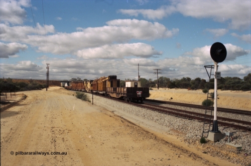 200-07
Moorine Rock, Westrail L class 271 departs the loop with the Barclay Mowlem ballast cleaning train, known as the Circus Train with a WGLA type waggon on the rear June 22, 1997.
