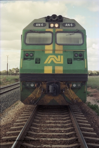 200-08
Moorine Rock, Australian National AN class unit AN 6 Clyde Engineering EMD model JT46C serial 93-1302, front view sits on the mainline with a Perth bound freight at 1500 hrs June 22, 1997.
Keywords: AN-class;AN6;Clyde-Engineering-Somerton-Victoria;EMD;JT46C;93-1302;