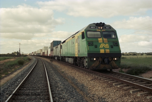 200-09
Moorine Rock, Australian National AN class AN 6 a Clyde Engineering built EMD model JT46C serial 93-1302, sits on the mainline with a Perth bound freight, 1500 hrs June 22, 1997.
Keywords: AN-class;AN6;Clyde-Engineering-Somerton-Victoria;EMD;JT46C;93-1302;