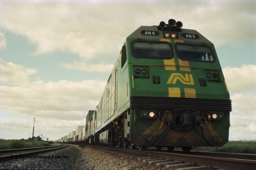 200-16
Moorine Rock, Australian National AN class AN 6 a Clyde Engineering built EMD model JT46C serial 93-1302, sits on the mainline with a Perth bound freight, June 22, 1997.
Keywords: AN-class;AN6;Clyde-Engineering-Somerton-Victoria;EMD;JT46C;93-1302;