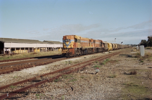 200-21
Midland, Westrail's Clyde Engineering built EMD model G26C as the DA class, DA 1573 serial 72-760 and DA 1574 serial 72-761 lead an empty grain train to Avon past the Midland Workshops at 0925 hrs June 24, 1997.
Keywords: DA-class;DA1573;Clyde-Engineering-Granville-NSW;EMD;G26C;72-760;