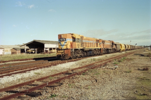 200-22
Midland, Westrail's Clyde Engineering built EMD model G26C as the DA class, DA 1573 serial 72-760 and DA 1574 serial 72-761 lead an empty grain train to Avon past the Midland Workshops at 0925 hrs June 24, 1997.
Keywords: DA-class;DA1573;Clyde-Engineering-Granville-NSW;EMD;G26C;72-760;