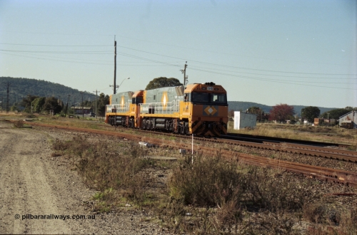 200-29
Midland, newly built Goninan GE model Cv40-9i NR class units NR 102 serial 7250-07/97-302 and NR 101 serial 7250-07/97-303 are conducting light engine trials prior to delivery to National Rail, 0931 hrs June 24, 1997.
Keywords: NR-class;NR101;Goninan;GE;CV40-9i;7250-07/97-303;