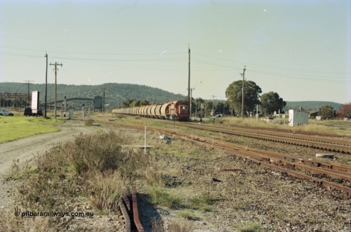200-31
Midland, loaded standard gauge grain train behind Westrail L class L 264 Clyde Engineering EMD model GT26C serial 68-554 crossing Lloyd Street grade crossing 0940 hrs June 24, 1997.
Keywords: L-class;L264;Clyde-Engineering-Granville-NSW;EMD;GT26C;68-554;