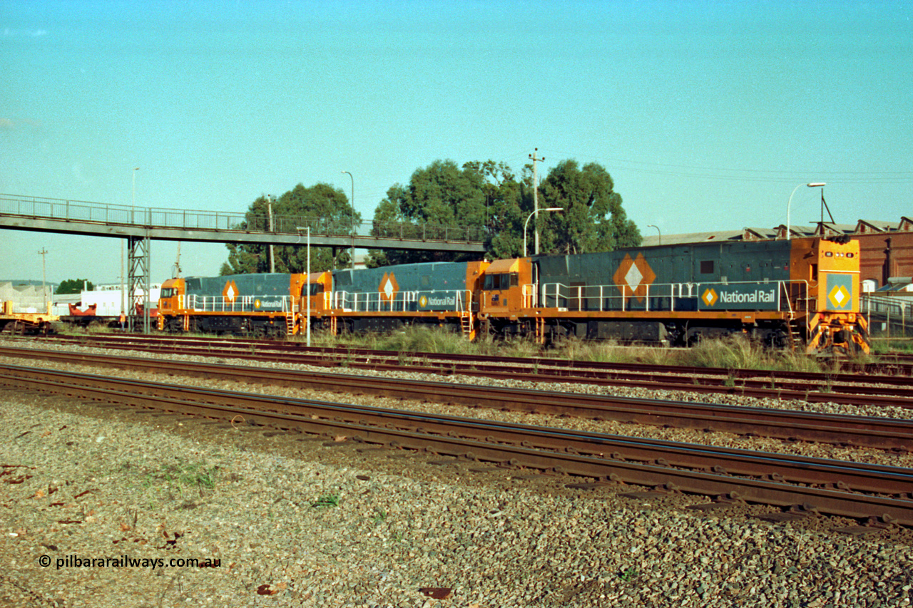 201-22
Midland, the first Perth built NR class NR 61 Goninan GE model Cv40-9i serial 7250-11/96-263 shunts at Midland with two brand new NR units NR 101 and NR 102 with waggon RQRX 60177.
Keywords: NR-class;NR61;Goninan;GE;CV40-9i;7250-11/96-263;