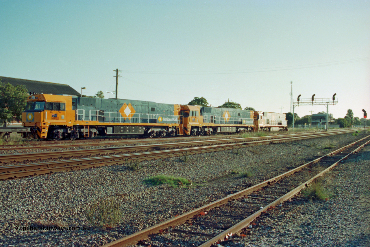 201-33
Midland, two brand Goninan WA built GE Cv40-9i model NR class units NR 102 serial 7250-07/97-302 and NR 101 serial 7250-07/97-303 with the original Perth built NR 61 serial 7250-11/96-263 as they await departure.
Keywords: NR-class;NR102;Goninan;GE;CV40-9i;7250-07/97-302;