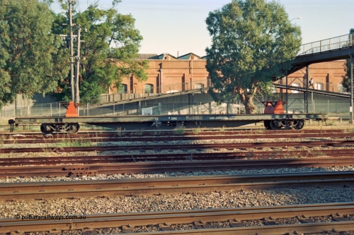 201-03
Midland, side view of RQRX type waggon RQRX 60177 a 53 tonne capacity flat waggon, originally built by Comeng NSW in 1971 as part of a batch of fifty CBX type waggons, later converted from NQBX type NQBX 21782.
Keywords: RQRX-type;RQRX60177;Comeng-NSW;CBX-type;CBX21782;