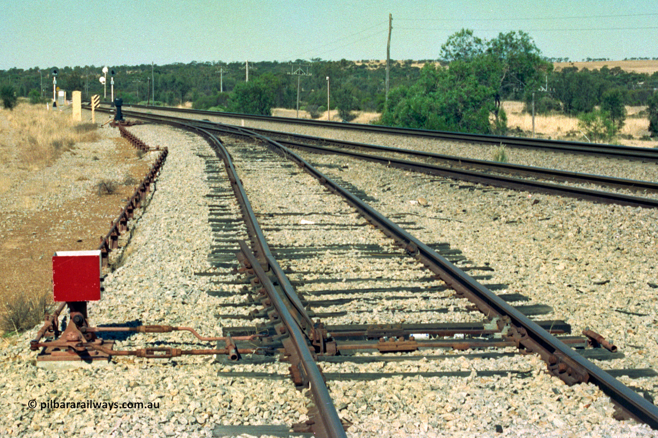 202-25
Meckering, view looking east with the east end catch points and dwarf indicator for the goods loop and rodding heading towards the interlocked ground frame where it re-joins the crossing loop.
