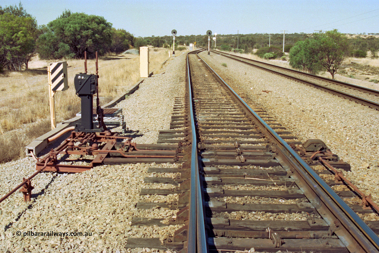 202-28
Meckering, looking east at the interlocking levers #1 and #2 and Pilot Key box 5B for the goods siding and derail at the east end of the crossing loop.
