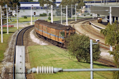 208-2-11
East Perth Passenger Terminal, diesel power narrow gauge commuter set operating under electric wiring.
