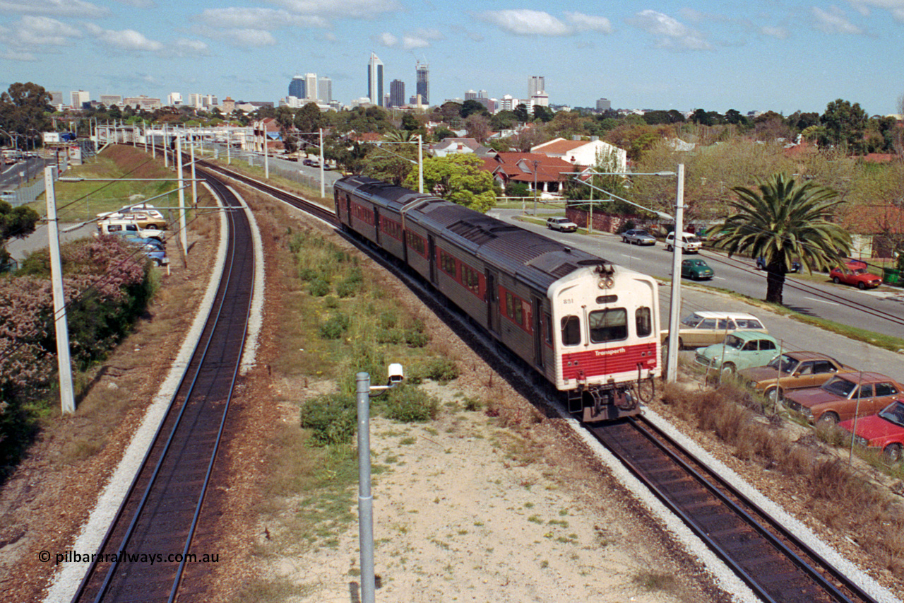 209-08
Mt Lawley station, narrow gauge Perth to Midland service arrives with an Goninan NSW built ADC class railcar ADC 851 leading an ADL class with the Perth skyline in the background.
Keywords: ADC-type;ADC851;Goninan-NSW;