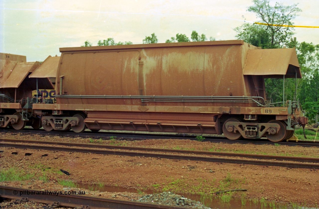 210-12
Weipa, Lorim Point railway workshops, Comeng Qld 1976 build HMAS type bottom discharge ore car 3089, this was the second last car of that order.
Keywords: HMAS-type;Comeng-Qld;Comalco;