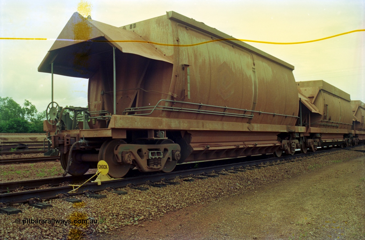210-13
Weipa, Lorim Point railway workshops, Comalco ore waggon 3089, 1 of 29 HMAS type built by Comeng Qld in 1974-76, behind it is car 3036 from the original order of 61 HMAS waggons also build by Comeng Qld in 1971-72, and now fitted with hungry boards.
Keywords: HMAS-type;Comeng-Qld;Comalco;