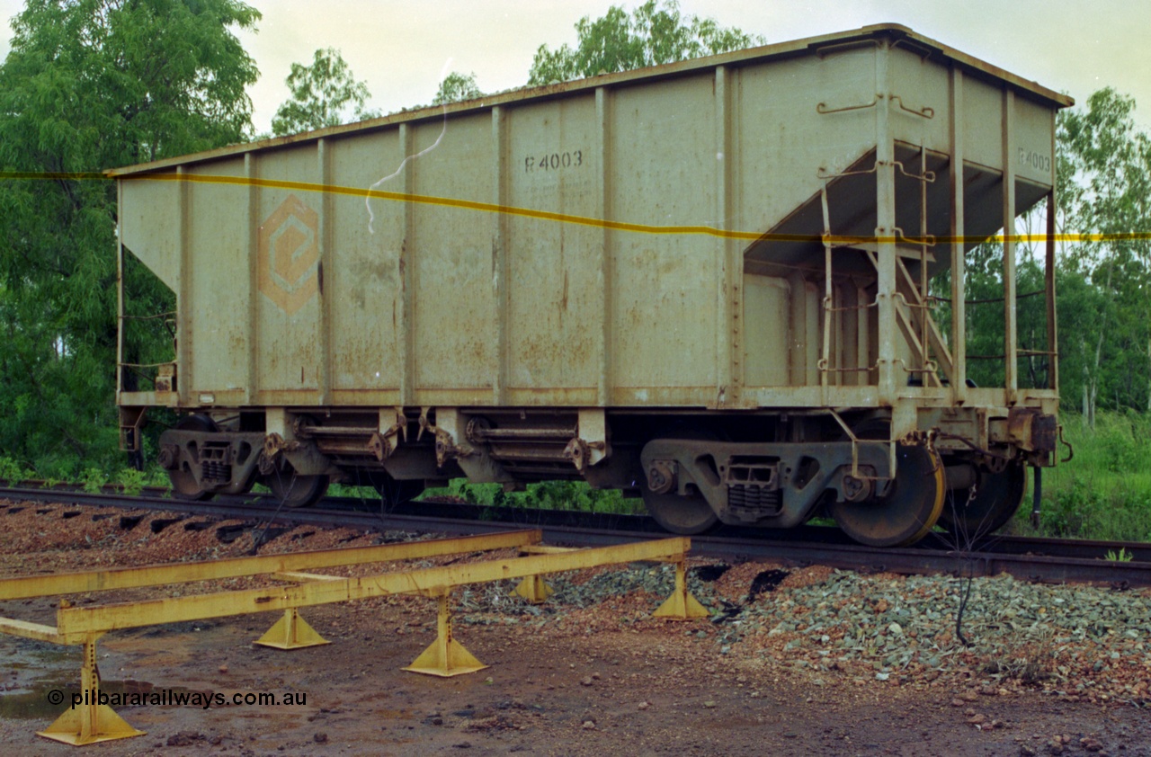 210-15
Weipa, Lorim Point track maintenance compound, the only ballast waggon in the rollingstock fleet is R 4003. Comeng Qld supplied a ballast waggon in 1971 (ordered in Feb 1971, delivered in Sept 1971), you can see the Comeng plate on the left hand end of the waggon frame, but this waggon does looks more like an American import.
Keywords: R4003;Comeng-Qld;Comalco;