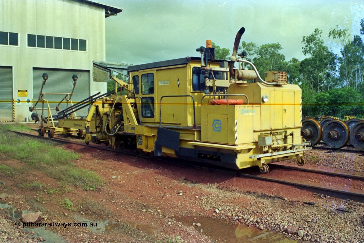 210-20
Weipa, Lorim Point railway workshops, Canron Rail Group Mk I switch tamper. Canron was taken over by Harsco in 1990-91.
Keywords: Canron;track-machine;Comalco;