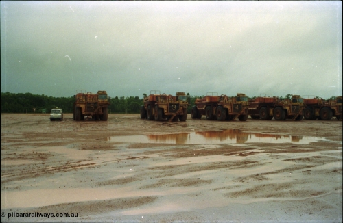 211-16
East Weipa Mine Centre, Komatsu HD1400's #426-05 and #03 with a Tubemakers belly dump trailers #426-23 and 21.
Keywords: Tubemakers;Komatsu;HD1400;