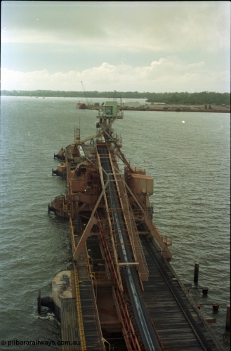 211-33
Weipa, Lorim Point view looking north from kaolin loader across no. 1 ship loader with Humbug Point Wharf (or town wharf) in the distance.
